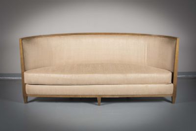 A CRESCENT SHAPED UPHOLSTERED SOFA, by Andree Putman sold for €1,700 at deVeres Auctions