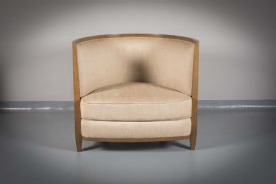 A CRESCENT SHAPED ARMCHAIR EN SUITE by Andre Putman sold for €500 at deVeres Auctions