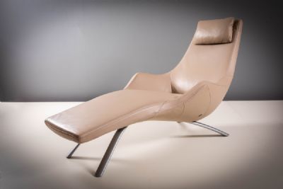 A CREAM LEATHER LOUNGE CHAIR, by Rolf Benz sold for €1,400 at deVeres Auctions