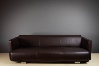 A BROWN LEATHER 6300 SOFA, STOOL AND ARMCHAIR by Rolf Benz sold for €2,200 at deVeres Auctions
