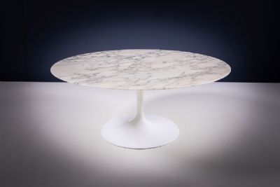 A COFFEE TABLE by Eero Saarinen sold for €1,800 at deVeres Auctions