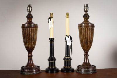 A PAIR OF SIMULATED WOODEN TABLE BALUSTER SHAPED TABLE LAMPS, at deVeres Auctions