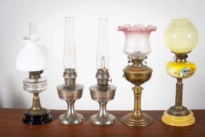 A COLLECTION OF MISCELLANEOUS OIL LAMPS AND GLASS SHADES. at deVeres Auctions