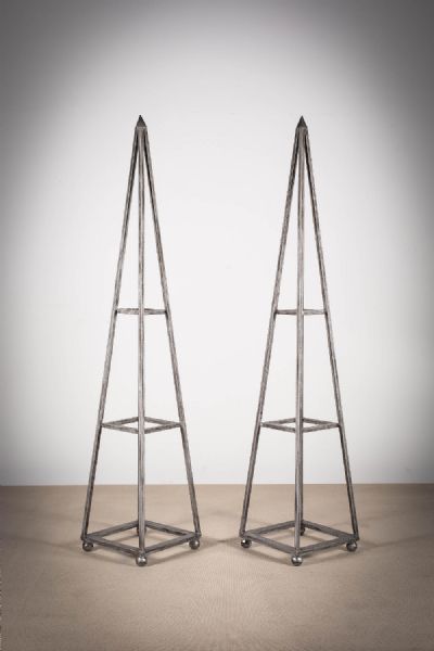A PAIR OF METAL PYRAMID SHAPED PLANT STANDS at deVeres Auctions
