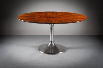 A ROSEWOOD CIRCULAR DINING TABLE, 1960s at deVeres Auctions