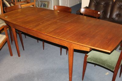 A TEAK DINING TABLE at deVeres Auctions