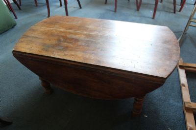 A DROPLEAF LOW TABLE at deVeres Auctions