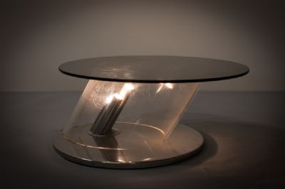 A 1970s CIRCULAR COFFEE TABLE at deVeres Auctions