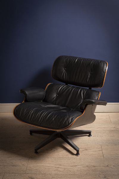 HERMAN MILLER CHAIR & STOOL by CHARLES AND RAY EAMES  at deVeres Auctions
