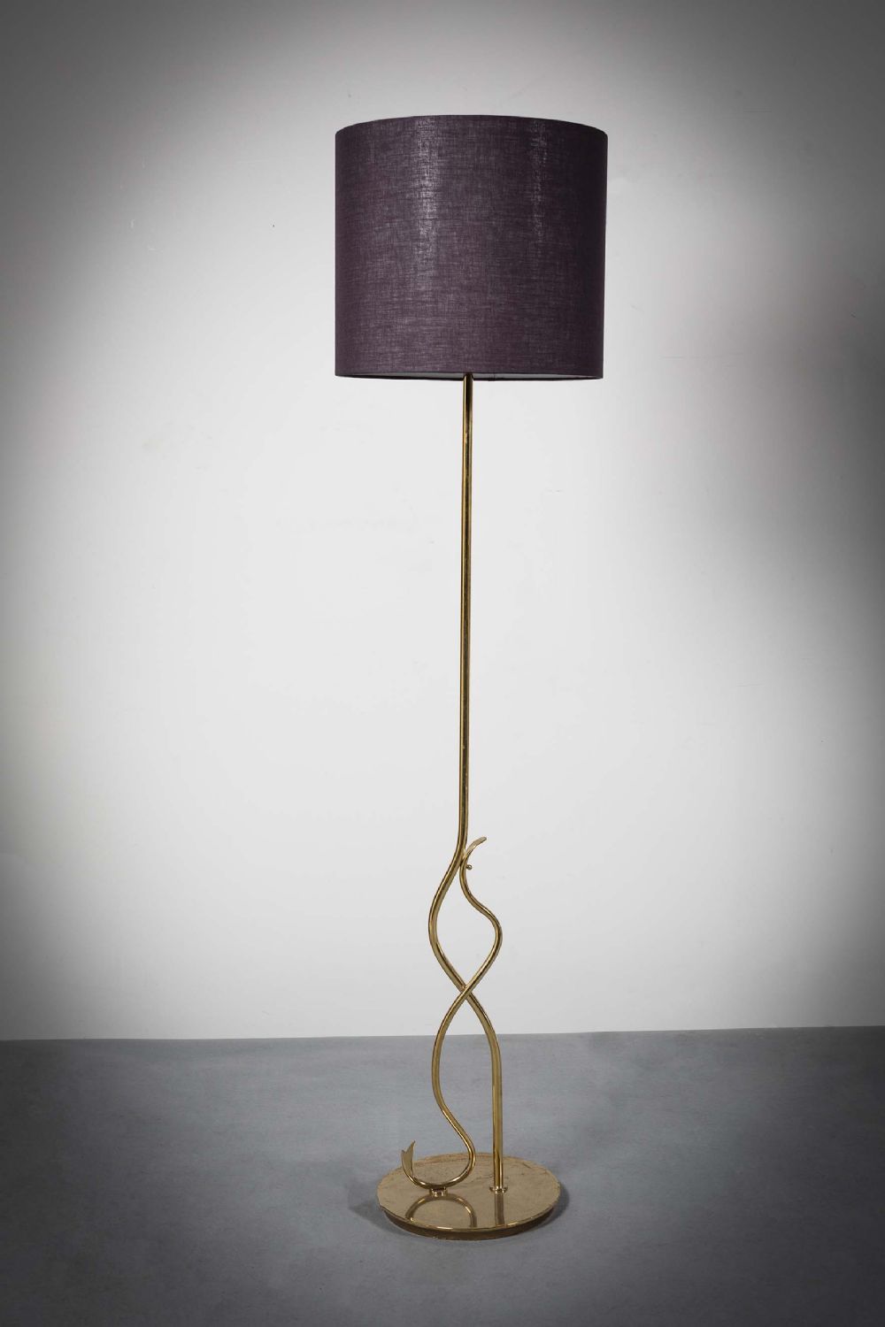 A GILT STANDARD LAMP at deVeres Auctions