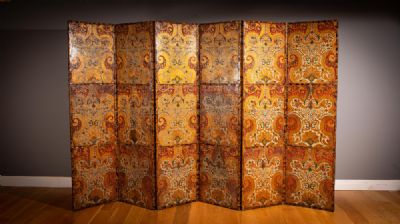 AN IMPRESSIVE LEATHER AND GILT EMBOSSED SIX FOLD SCREEN at deVeres Auctions