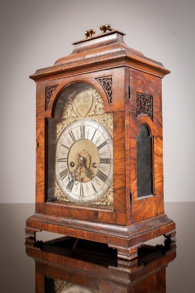 A WALNUT CASED BRACKET CLOCK, by WILLIAM MARSHALL, sold for €4,000 at deVeres Auctions