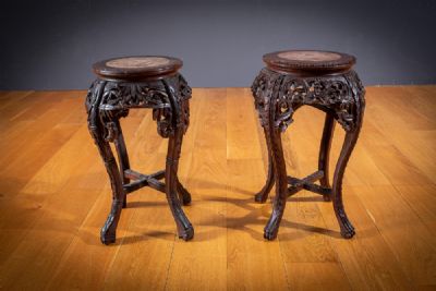 A pair of ebonised and marble topped urns stands, at deVeres Auctions
