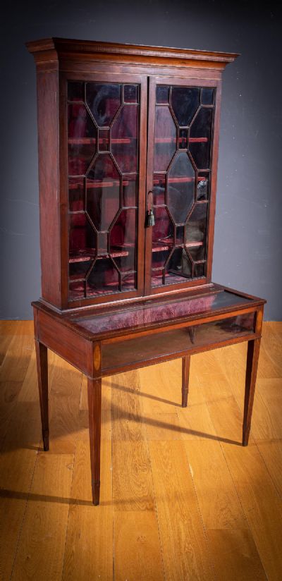 A MAHOGANY AND INLAID DISPLAY CABINET, 19TH CENTURY at deVeres Auctions