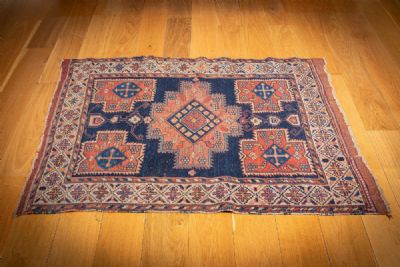AN ORIENTAL RUG at deVeres Auctions