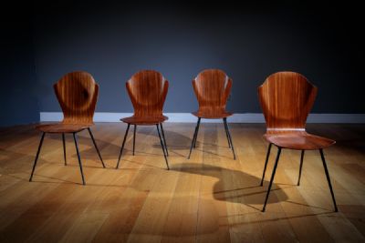 A SET OF FOUR SHAPED PLYWOOD CHAIRS by CARLO RATTI  at deVeres Auctions