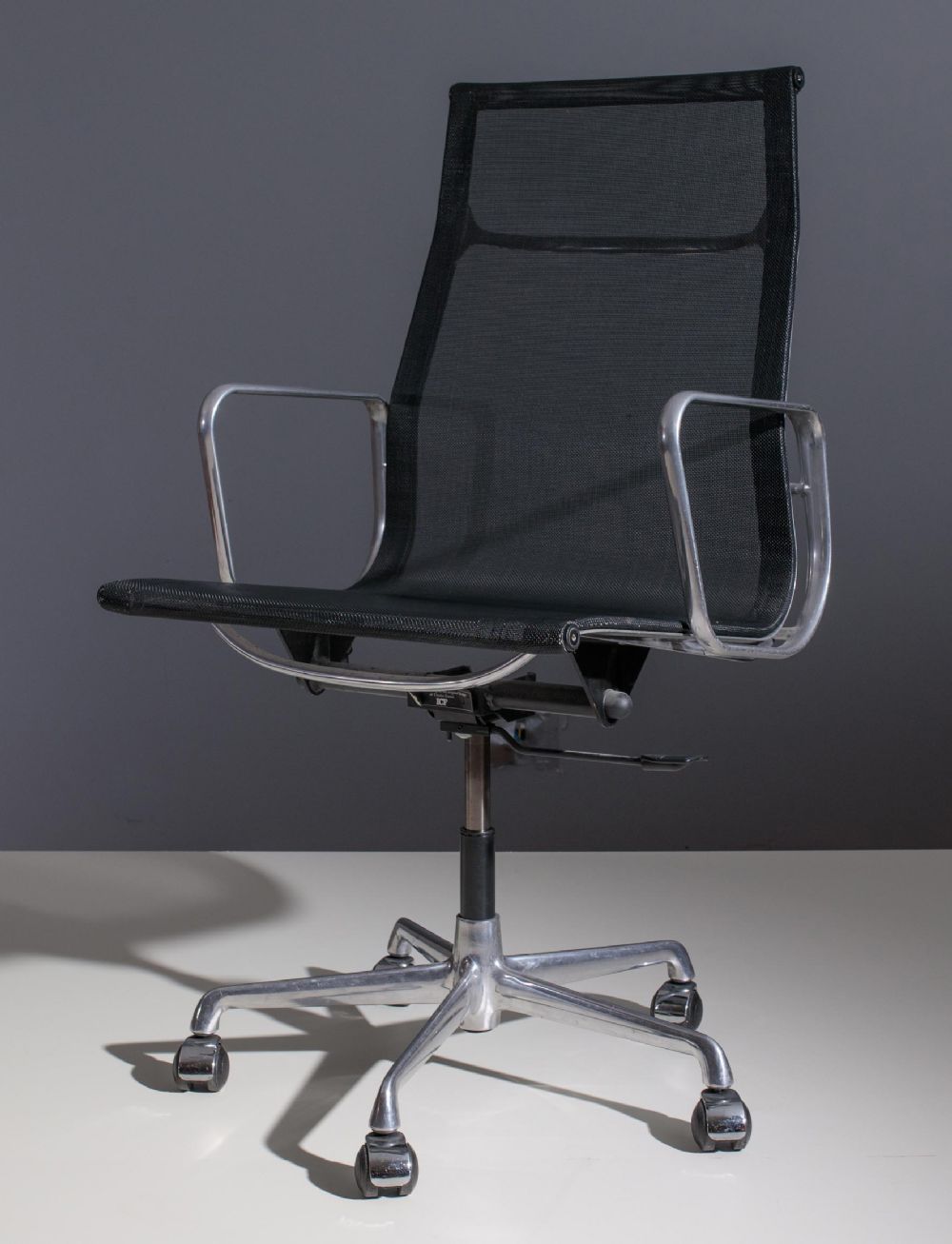 AN E119 EXECUTIVE CHAIR by CHARLES AND RAY EAMES  at deVeres Auctions