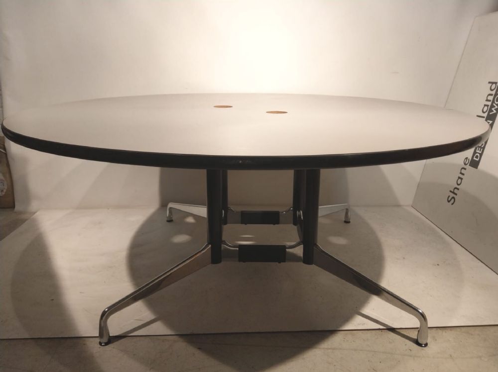 A SEGMENTED TABLE by CHARLES AND RAY EAMES  at deVeres Auctions