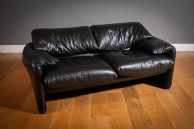 A BLACK LEATHER MARALUNGA SOFA, by CASSINA  at deVeres Auctions