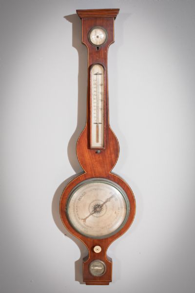 A MAHOGANY AND INLAID BAROMETER WITH STEEL ENGRAVED DIAL at deVeres Auctions