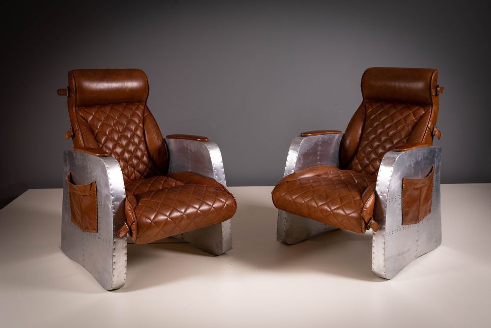 A PAIR OF LEATHER AND ALUMINIUM FRAMED AVIATOR CHAIRS