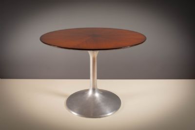 A ROSEWOOD CIRCULAR DINING TABLE, ITALIAN 1960's. at deVeres Auctions