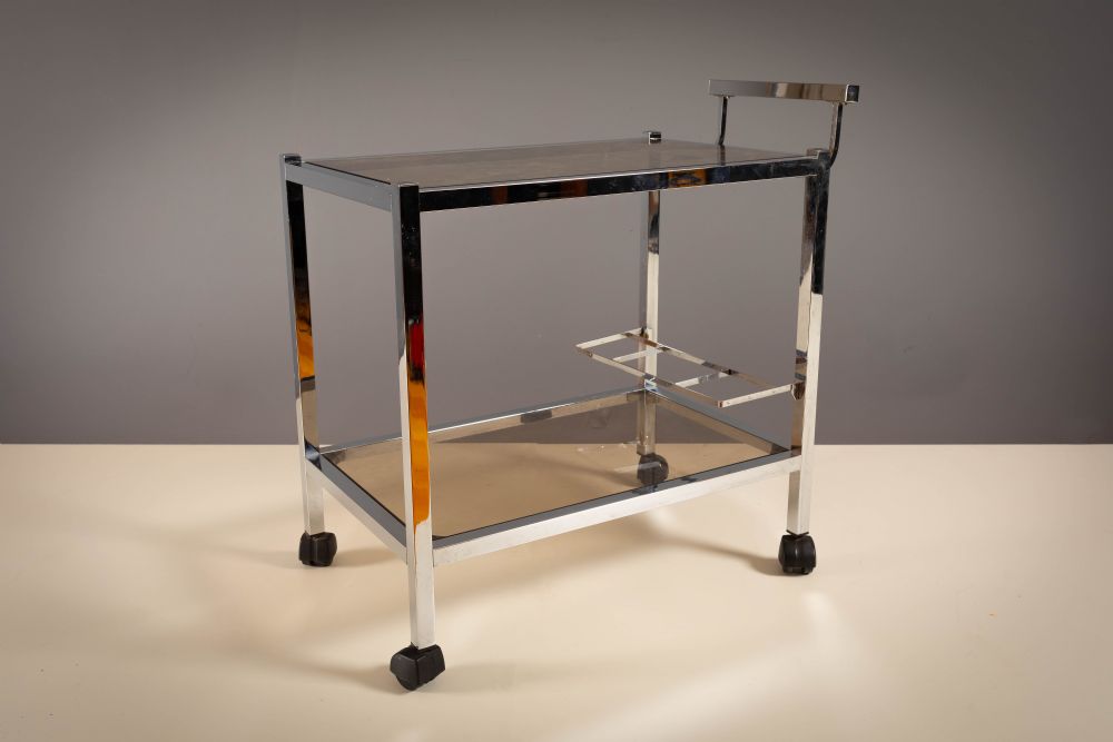 A CHROME ART DECO STYLE COCKTAIL TROLLEY, 1970s