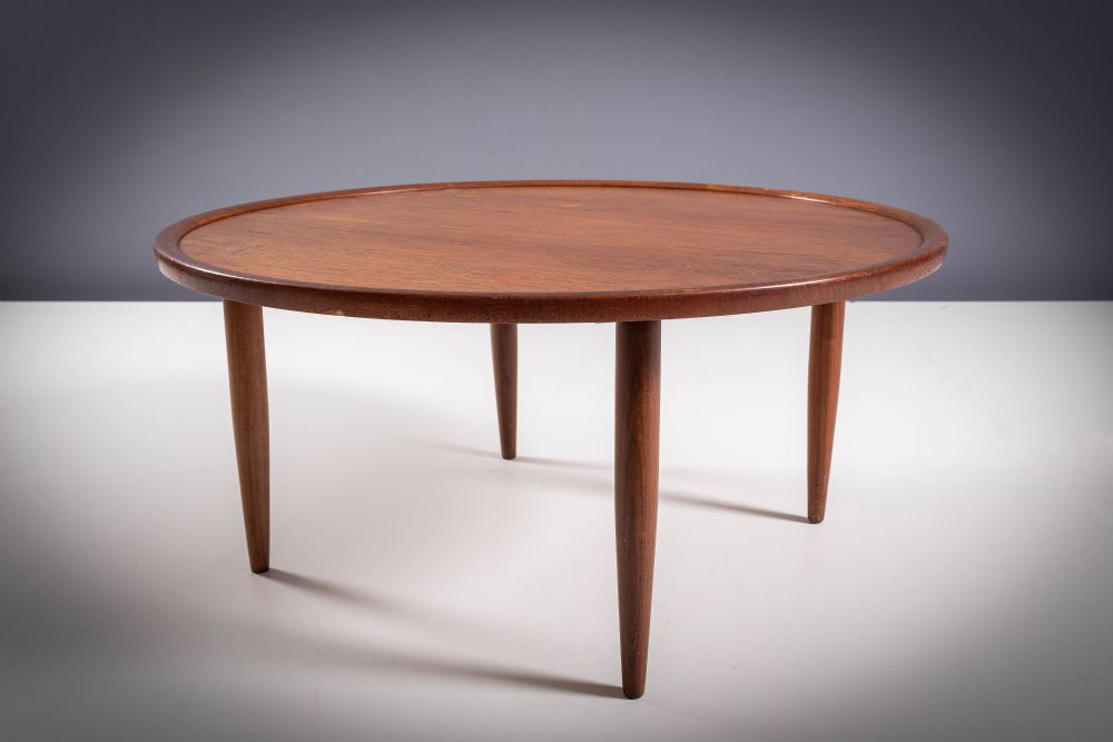 A CIRCULAR TEAK LOW TABLE, DANISH 1960s