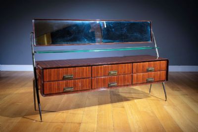 A FINE ROSEWOOD AND BRASS DRESSING TABLE by SILVIO CAVATORTA, I  at deVeres Auctions