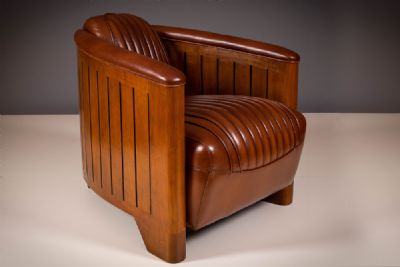 A LEATHER AND TEAK FRAMED CLUB AVIATOR CHAIR, at deVeres Auctions
