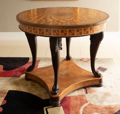 A PARQUETRY WOOD CENTRE TABLE at deVeres Auctions
