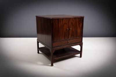 A MAHOGANY DRINKS CABINET at deVeres Auctions