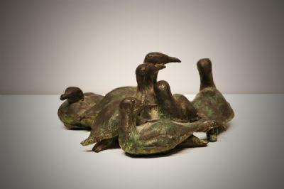 GUILLEMOTS ON A ROCKY COAST by Oisin Kelly sold for €3,400 at deVeres Auctions