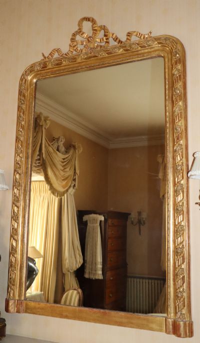 232 by A CONTINENTAL GILTWOOD MIRROR  at deVeres Auctions