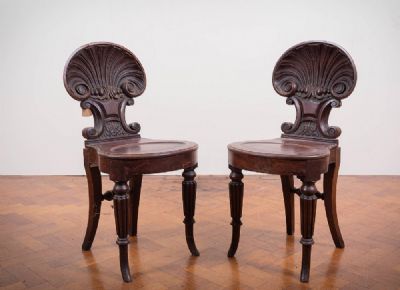 25 by A PAIR OF HALL CHAIRS  at deVeres Auctions