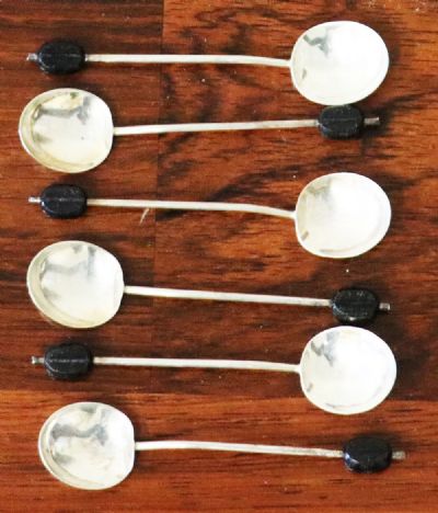 262 by A SET OF SIX SILVER BIRMINGHAM COFFEE BEAN SPOONS  at deVeres Auctions