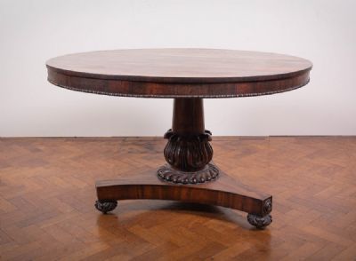 4 by A CIRCULAR CENTRE TABLE  at deVeres Auctions