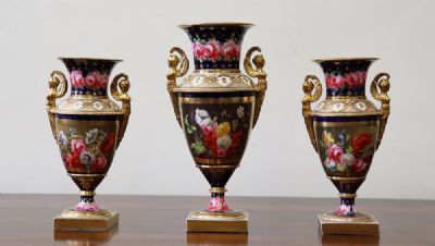 63 by THREE URN SHAPED VASES  at deVeres Auctions