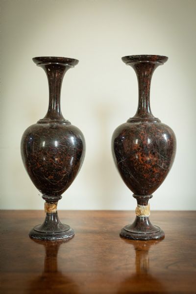 74 by A PAIR OF MARBLE URNS  at deVeres Auctions