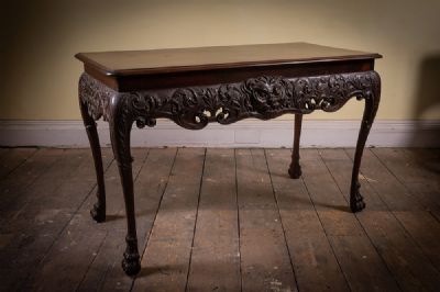 64 by AN IRISH MAHOGANY SIDE TABLE  at deVeres Auctions