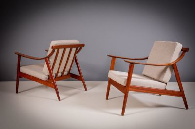 24 by A PAIR OF EASY CHAIRS  at deVeres Auctions