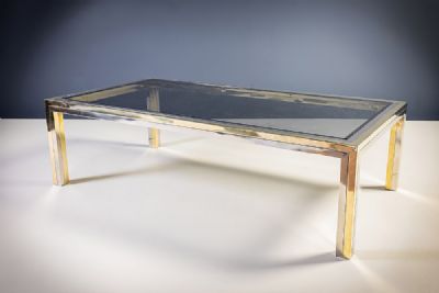 A CHROME AND GILT TABLE by Romeo Rega  at deVeres Auctions
