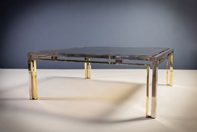 A CHROME AND GILT TABLE by Romeo Rega  at deVeres Auctions