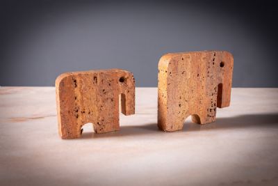 A PAIR OF TRAVERTINE ELEPHANTS by Fratelli Manelli  at deVeres Auctions