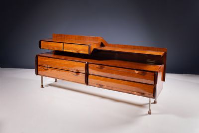 A ROSEWOOD SIDEBOARD by Gianfranco Frattini  at deVeres Auctions