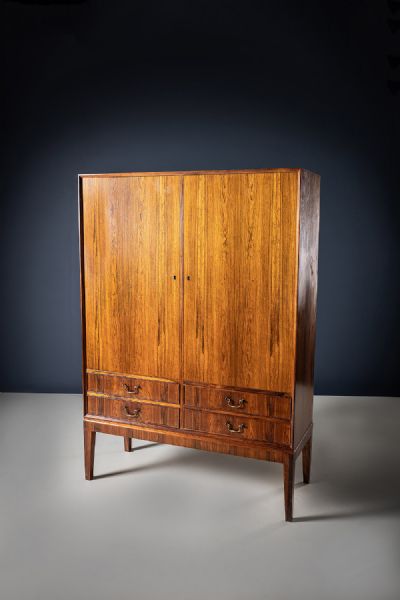 89 by A Rosewood Cabinet  at deVeres Auctions