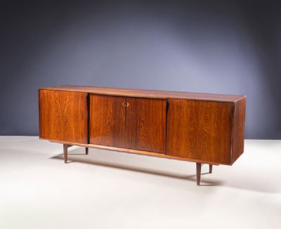A ROSEWOOD SIDEBOARD by Henry Rosengran-Hansen  at deVeres Auctions